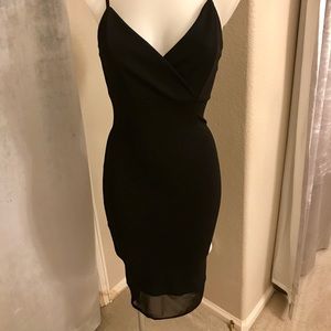 Black midi dress with sheer hem